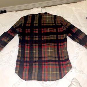 Burberry Brit slim fit button down shirt. I would say like an autumn color.